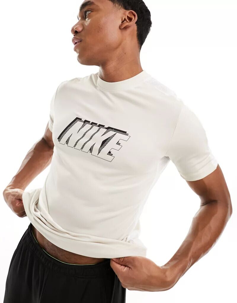 

Бежевая футболка с графическим рисунком Nike Academy Dri-FIT