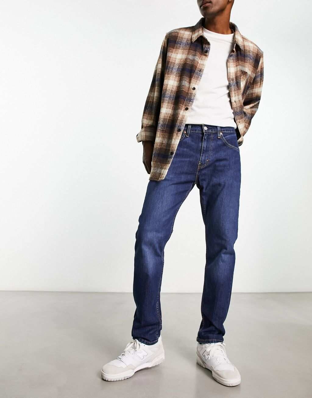

Темно-синие зауженные джинсы Levi's 502