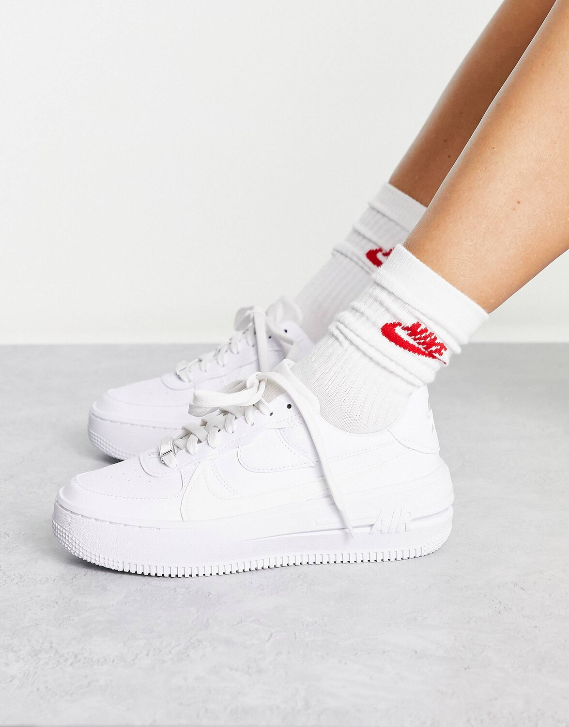 

Кроссовки Nike Air Force 1 PLT.AF.ORM тройного белого цвета