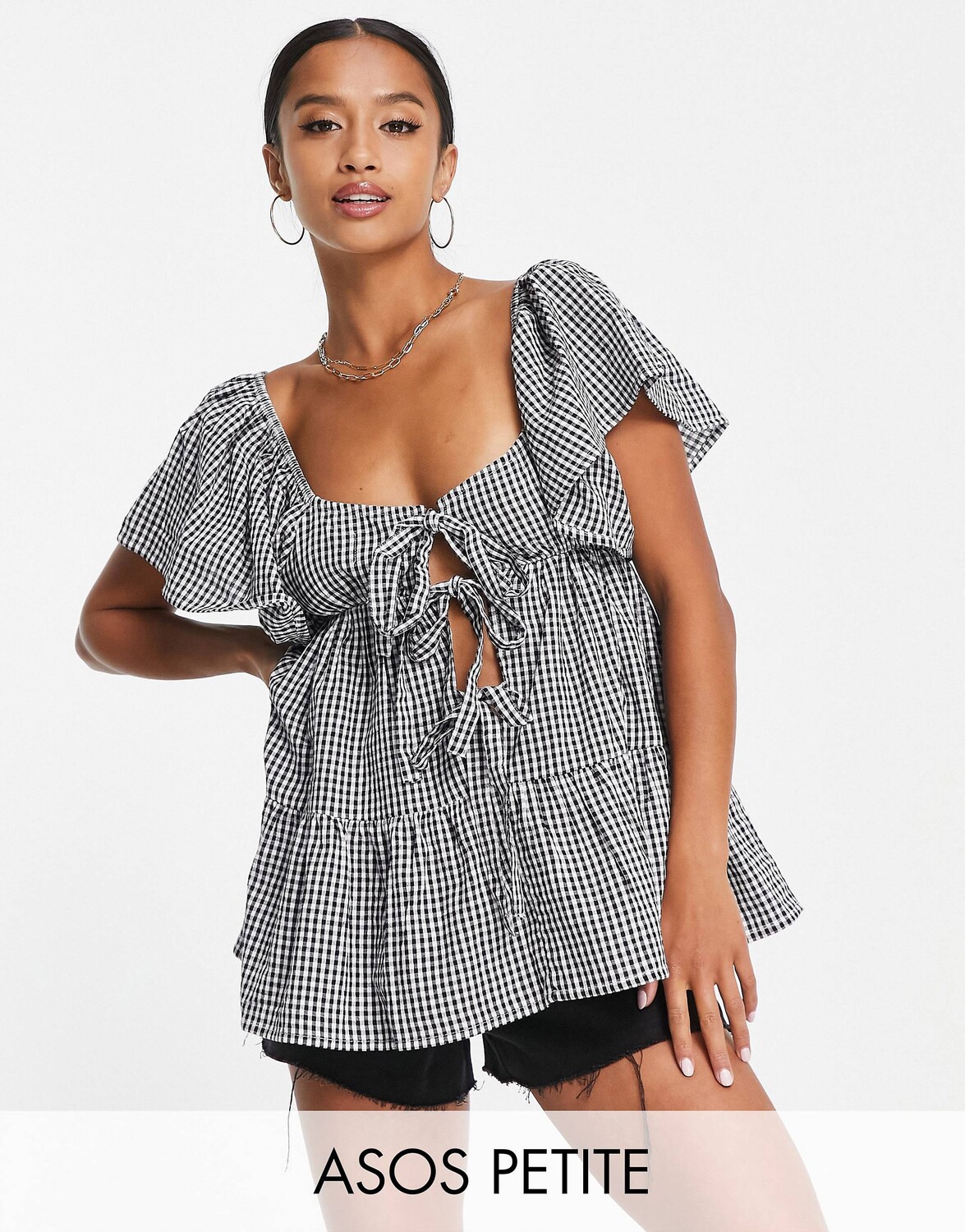 

Многоярусный солнцезащитный топ в клетку из сирсакера ASOS DESIGN Petite