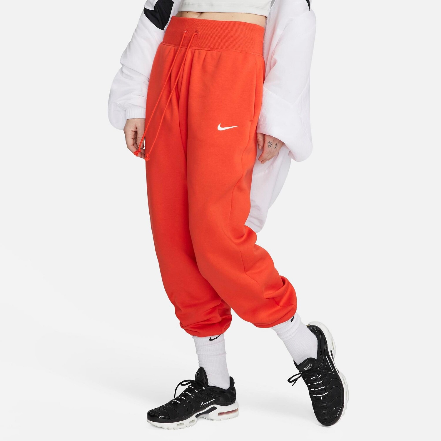 

Женские брюки свободного кроя из флиса Nike Sportswear Phoenix Fleece, красный