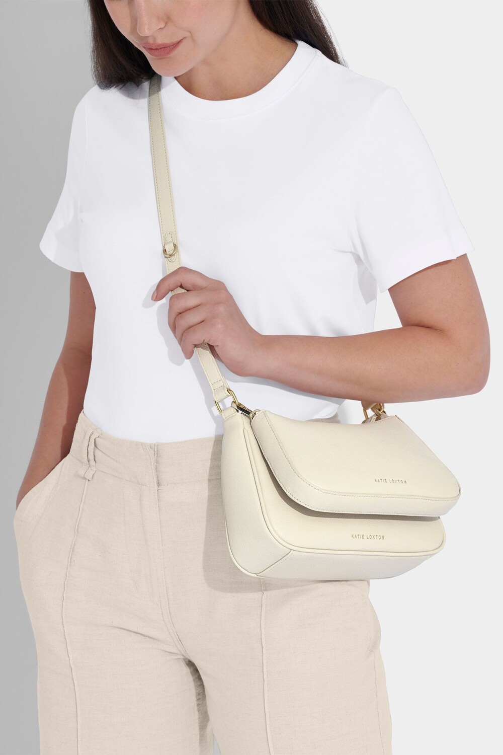 

Сумка через плечо Aria с овальной формой Katie Loxton, белый