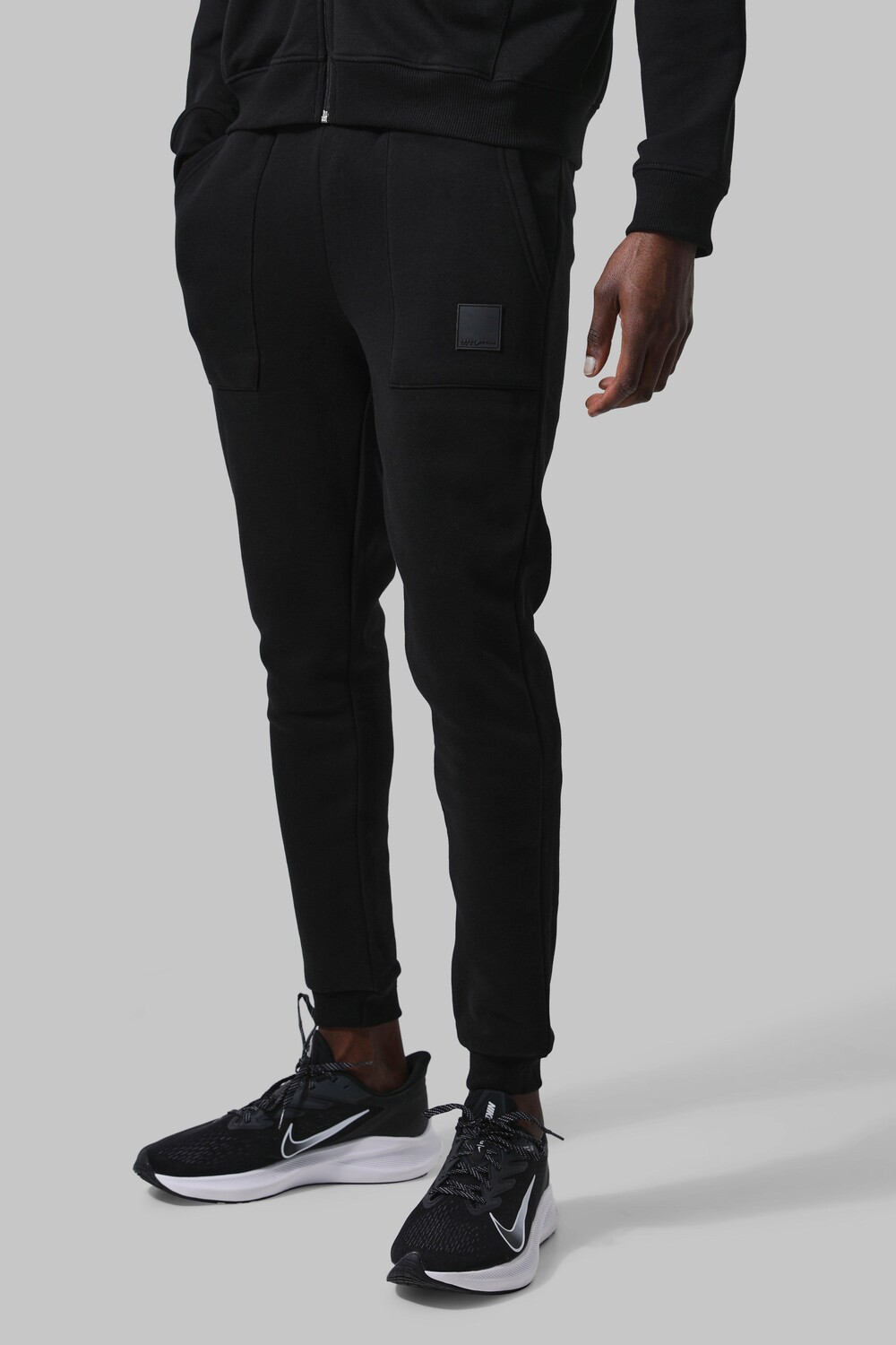 

Джоггеры man active gym с карманами Boohoo, черный