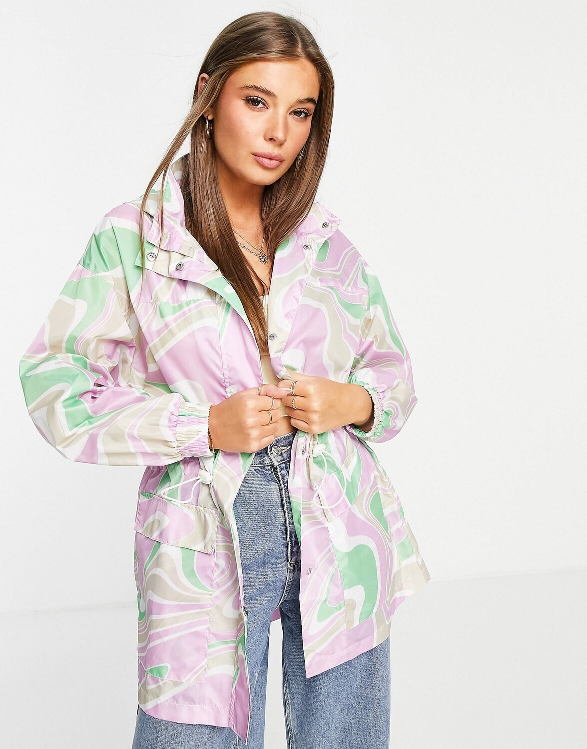 

Розовый и зеленый дождевик с принтом ASOS DESIGN