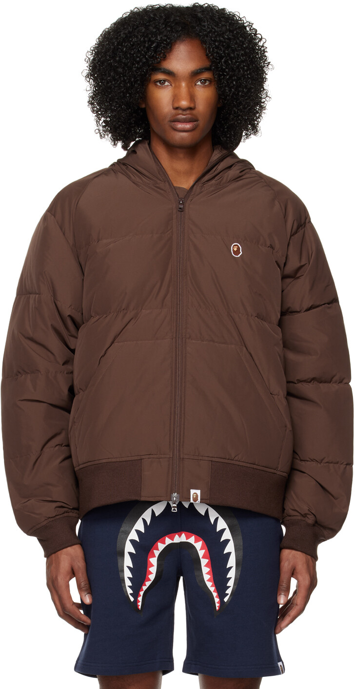 

Коричневый пуховик с одним заостренным концом BAPE