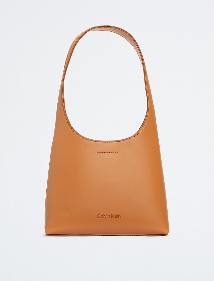 

Сумка на плечо Elemental Curve Calvin Klein, коричневый