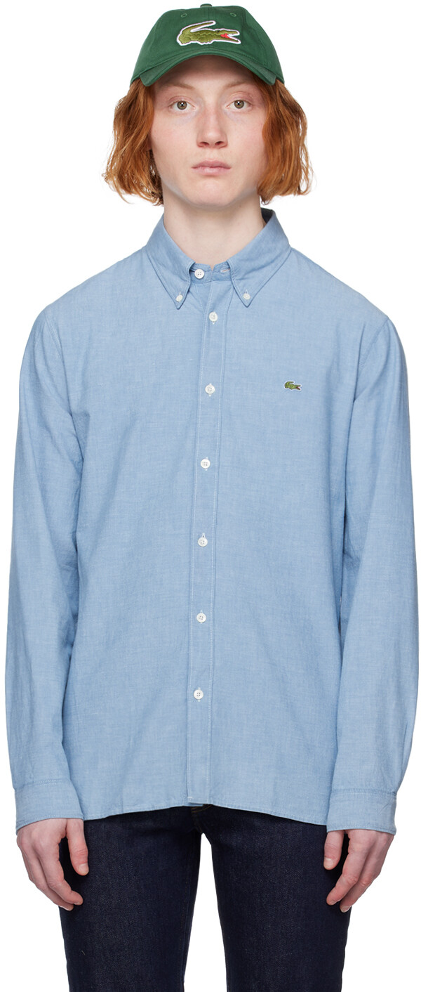 

Синяя рубашка с нашивками Lacoste
