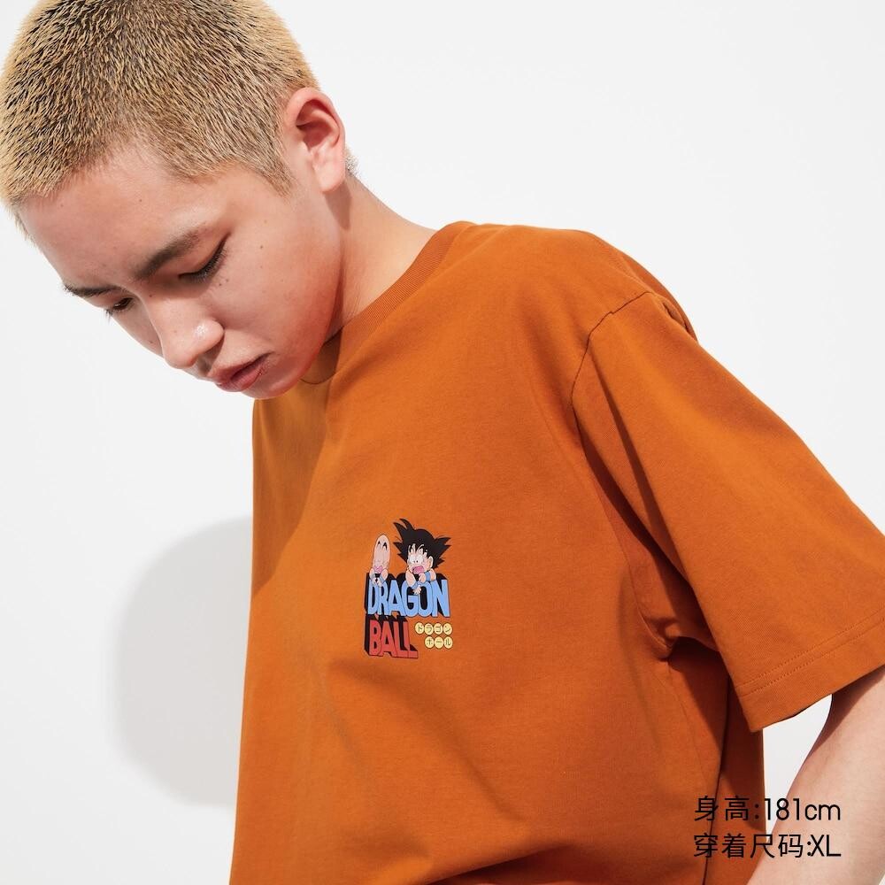 

Футболка с принтом унисекс Uniqlo, оранжевый