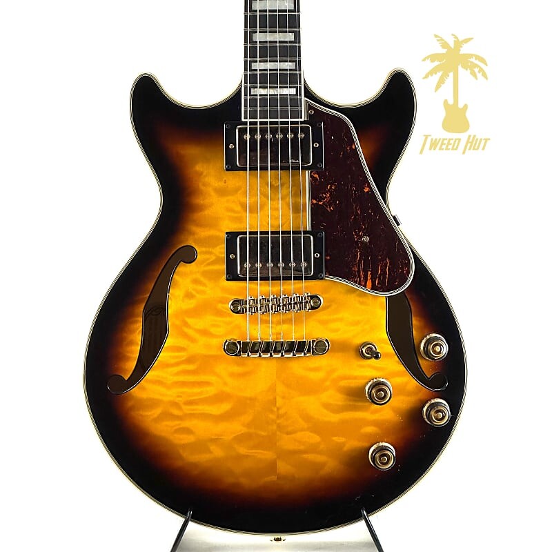 

Полуакустическая электрогитара Ibanez Artcore Expressionist AM93QM - Antique Yellow Sunburst Artcore Expressionist AM93QM Semi-Hollow Electric Guitar - Antique Yellow Sunburst