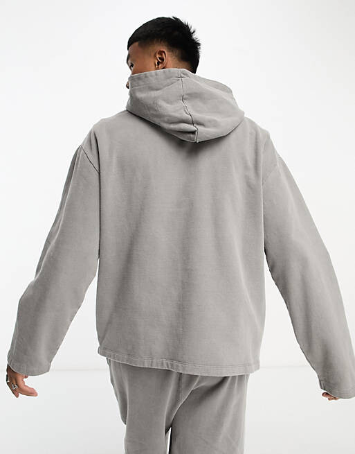 

Толстовка унисекс в стиле унисекс с темно-серым принтом спереди ASOS Design