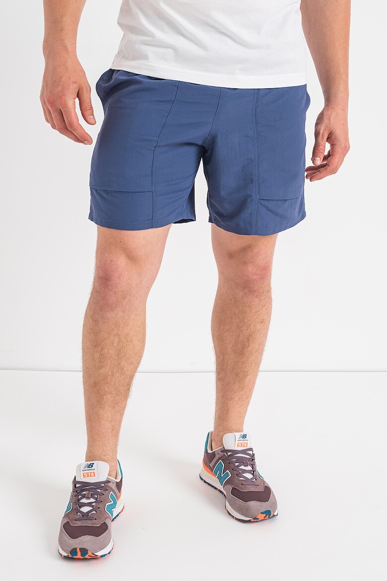 

Короткие брюки с 3 карманами New Balance, синий