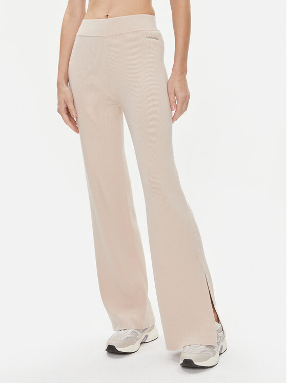 цена Трикотажные брюки широкого кроя Calvin Klein, бежевый