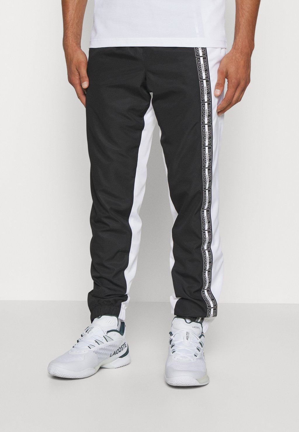 Спортивные брюки Tennis Pant Lacoste, цвет noir/blanc