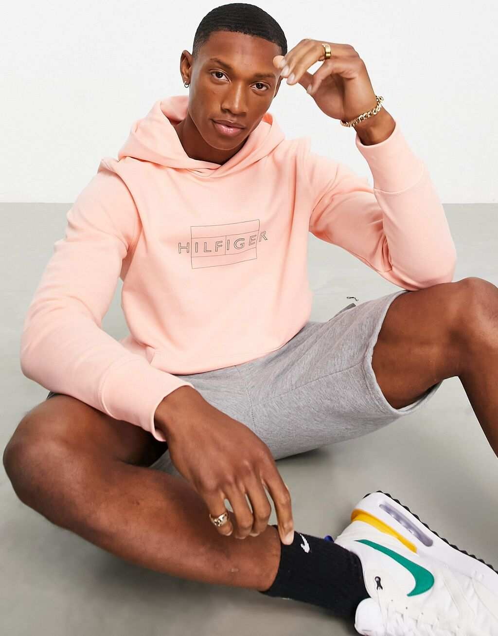 

Розовая толстовка с логотипом и линейным флагом Tommy Hilfiger