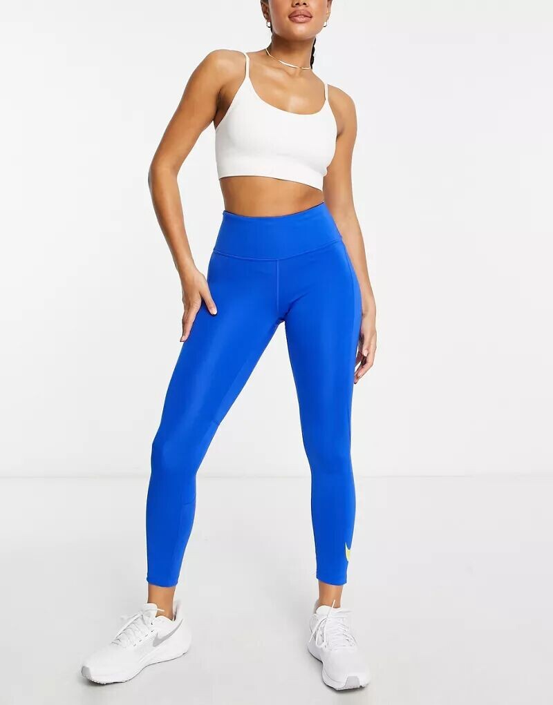 

Синие леггинсы размером 7/8 с логотипом Nike Swoosh
