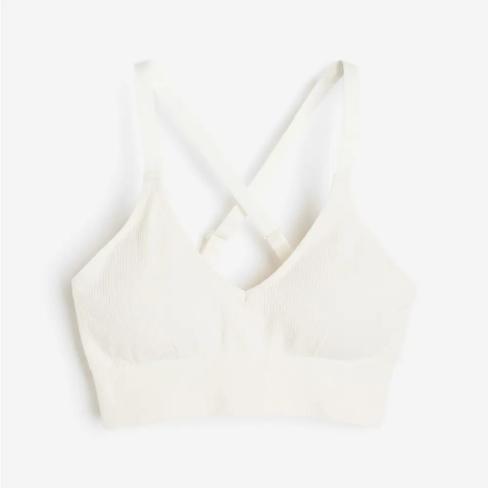 

Спортивный топ H&M DryMove Medium Support, белый