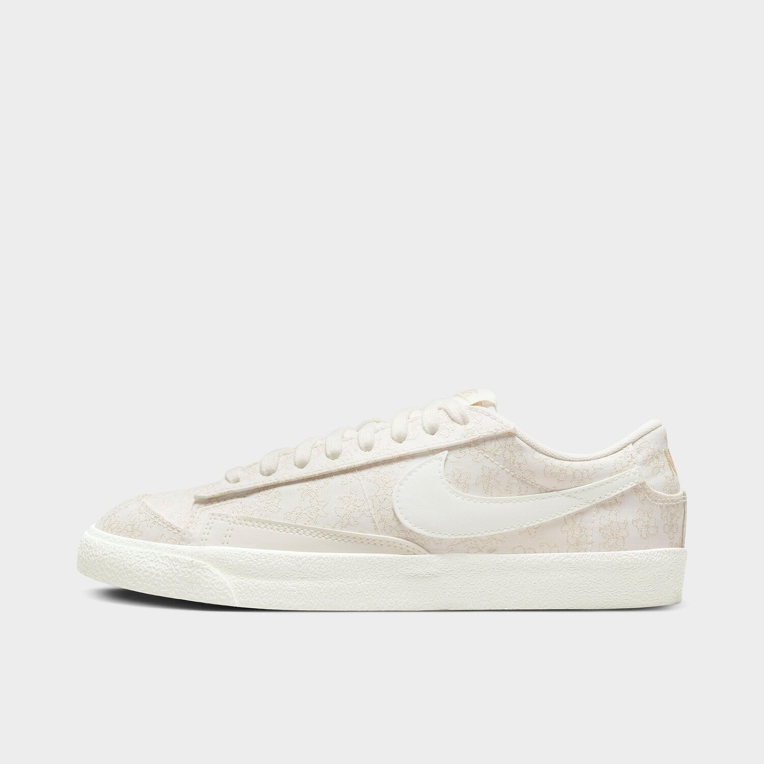 

Женская повседневная обувь Nike Blazer Low '77 SE с цветочным принтом, кремовый