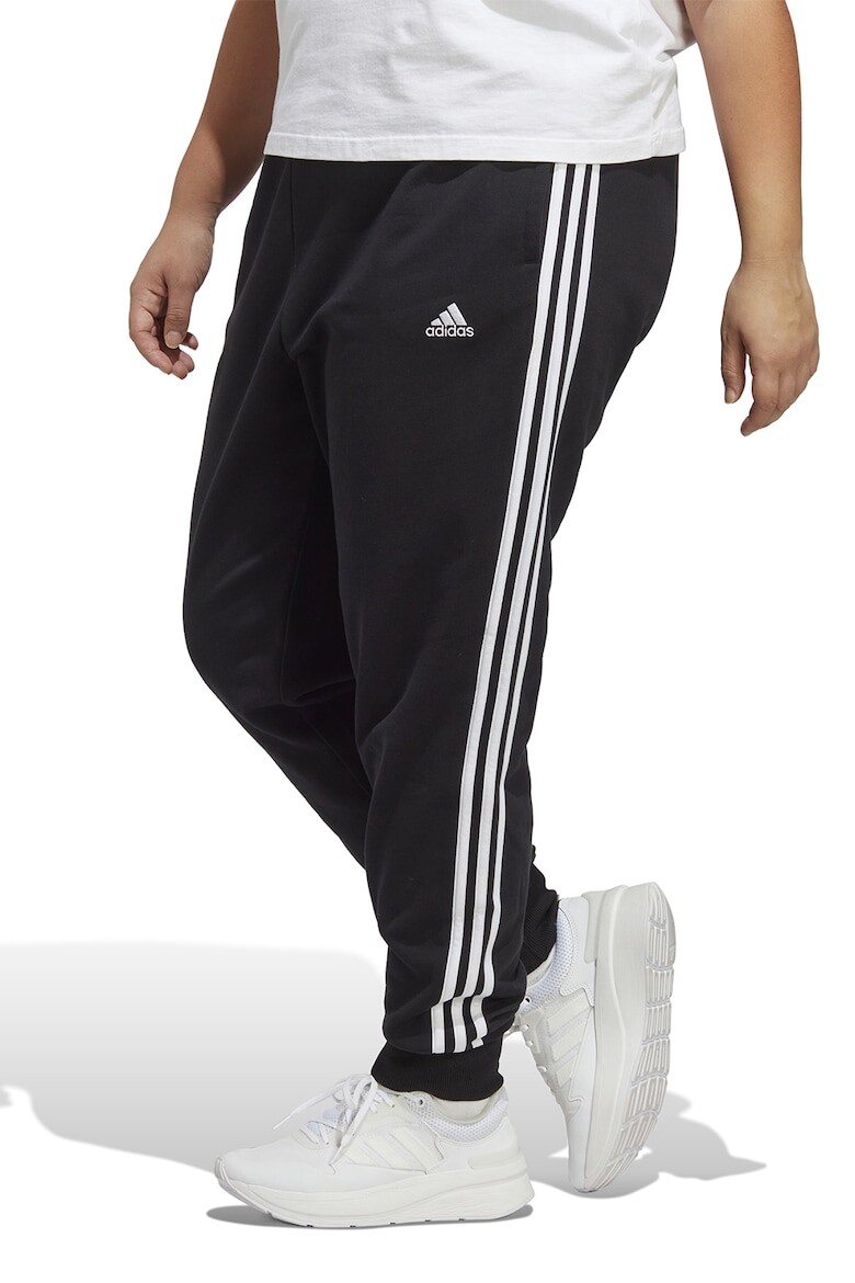 

Спортивные брюки с зауженным кроем и карманами Adidas Sportswear, черный
