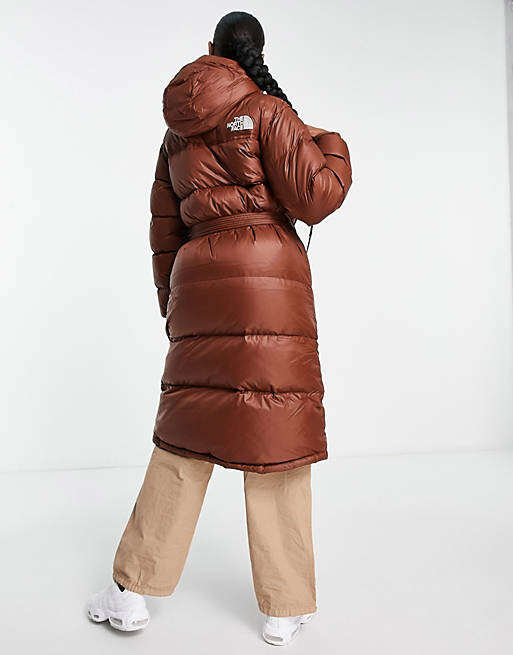 

Коричневая длинная пуховая парка с поясом The North Face Nuptse