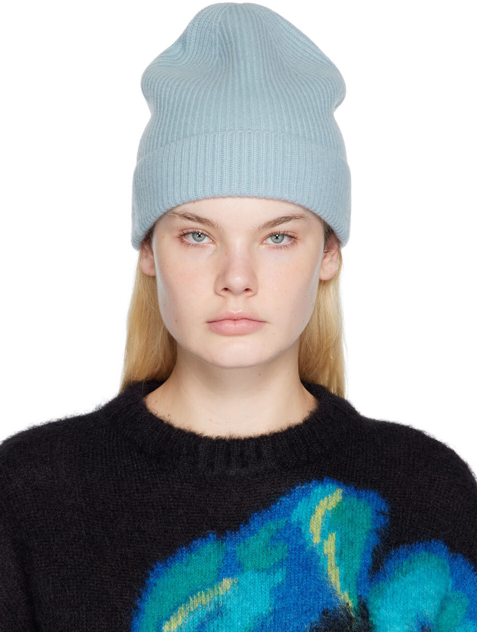 

Синяя шапка в рубчик Nina Ricci
