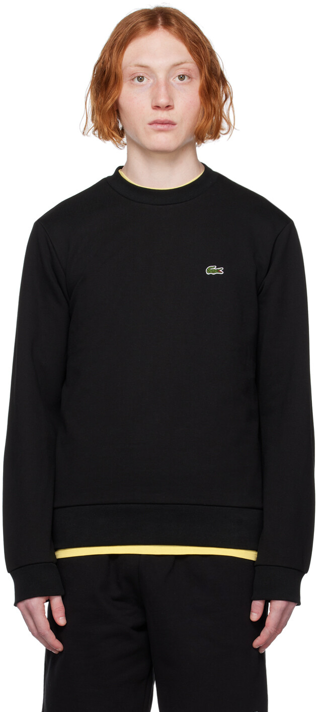 

Черная толстовка с нашивками Lacoste