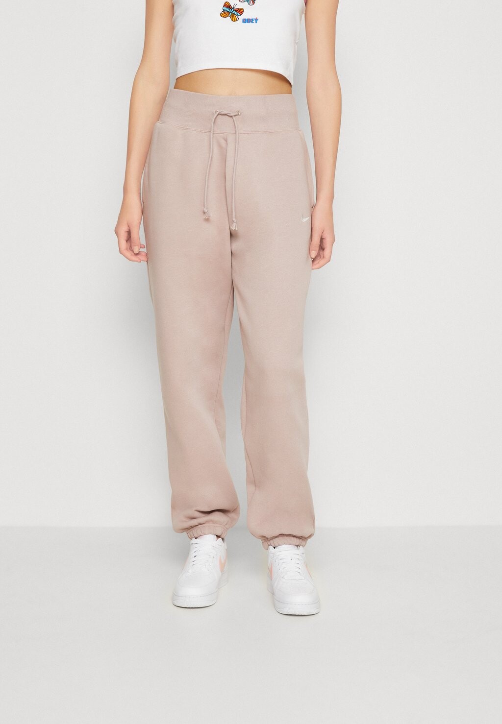 

Спортивные брюки Nike Pant, диффузный серо-коричневый / парус, Серый