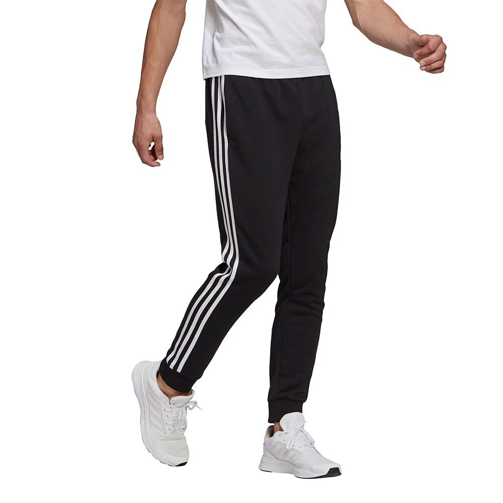

Брюки adidas Sportswear Essentials French Terry Tapered Cuff 3-Stripes, черный
