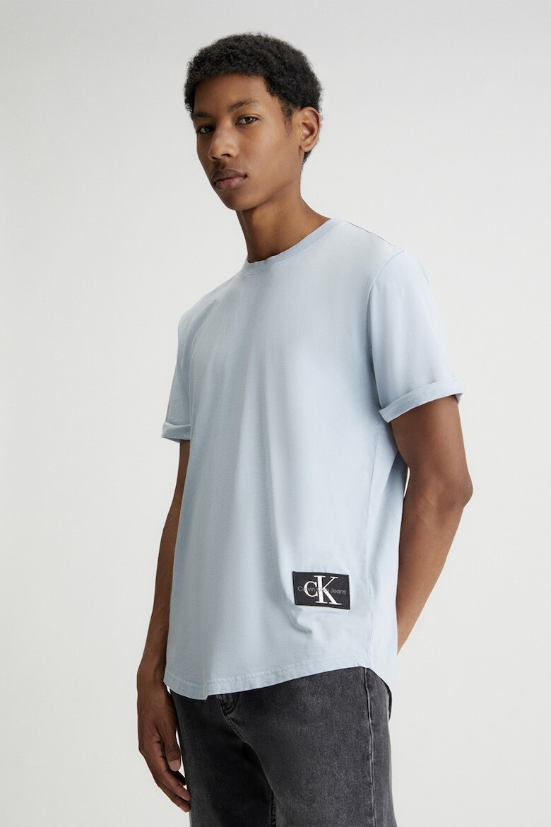 

Хлопковая футболка с закатанными рукавами Calvin Klein Jeans, синий