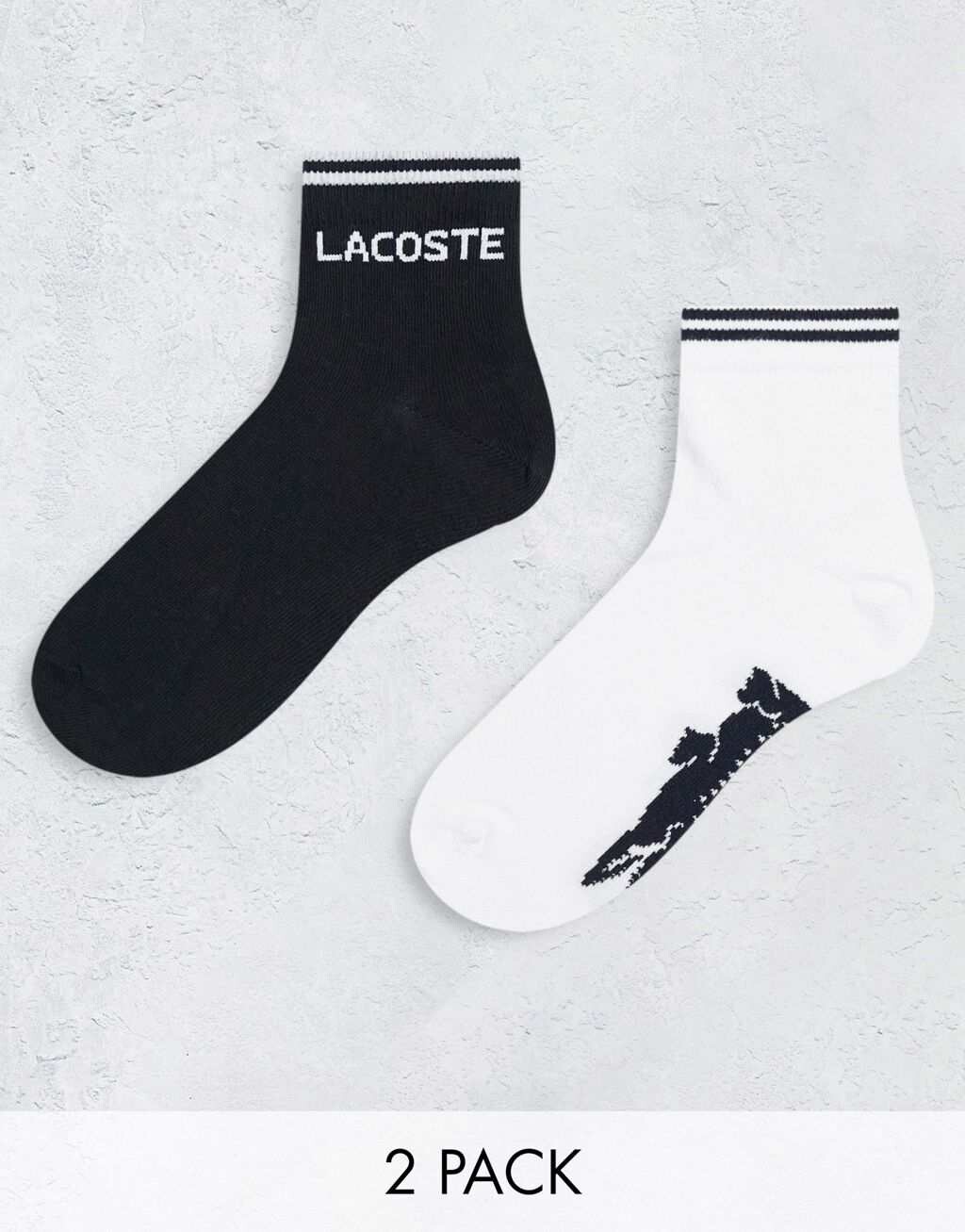 

Две пары черных и белых носков Lacoste