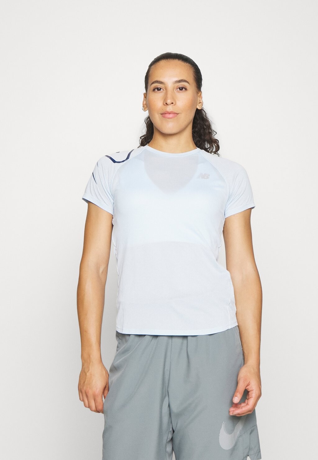 

Спортивная футболка New Balance, Коричневый