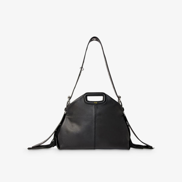 Кожаная сумка на плечо miss m с тисненым логотипом и бахромой Maje, цвет noir / gris