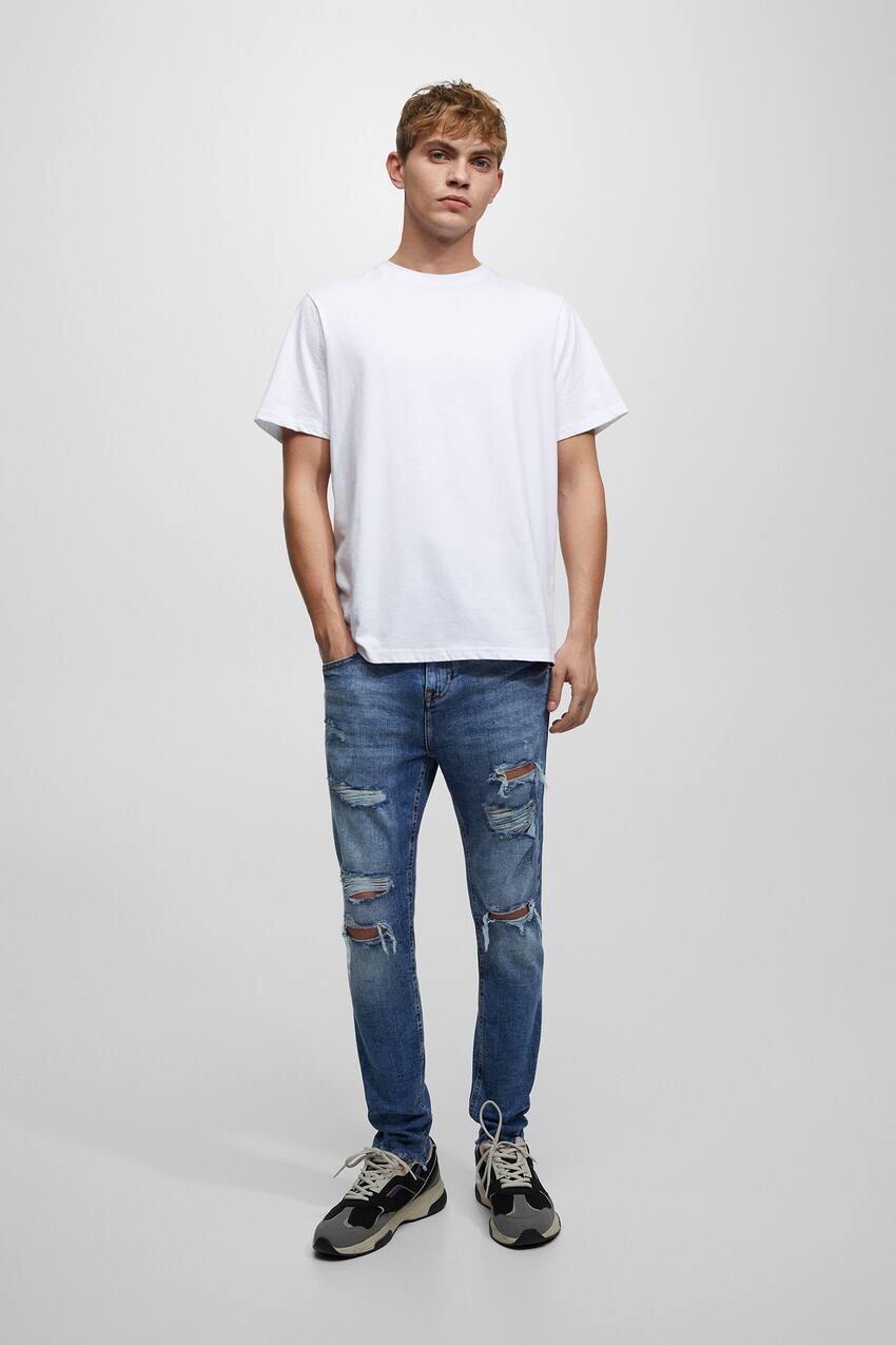 

Рваные суперскинни джинсы с брызгами краски Pull&Bear, синий