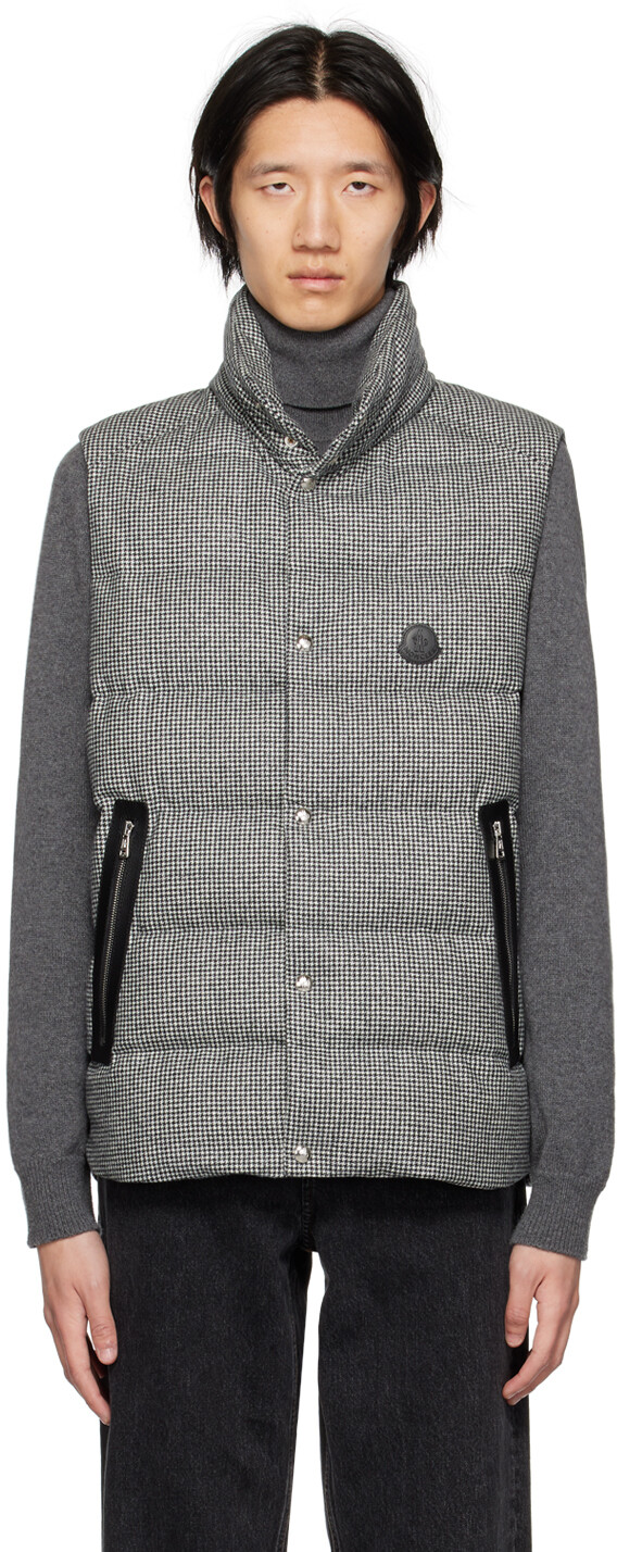 

Серый пуховый жилет Herniare Moncler