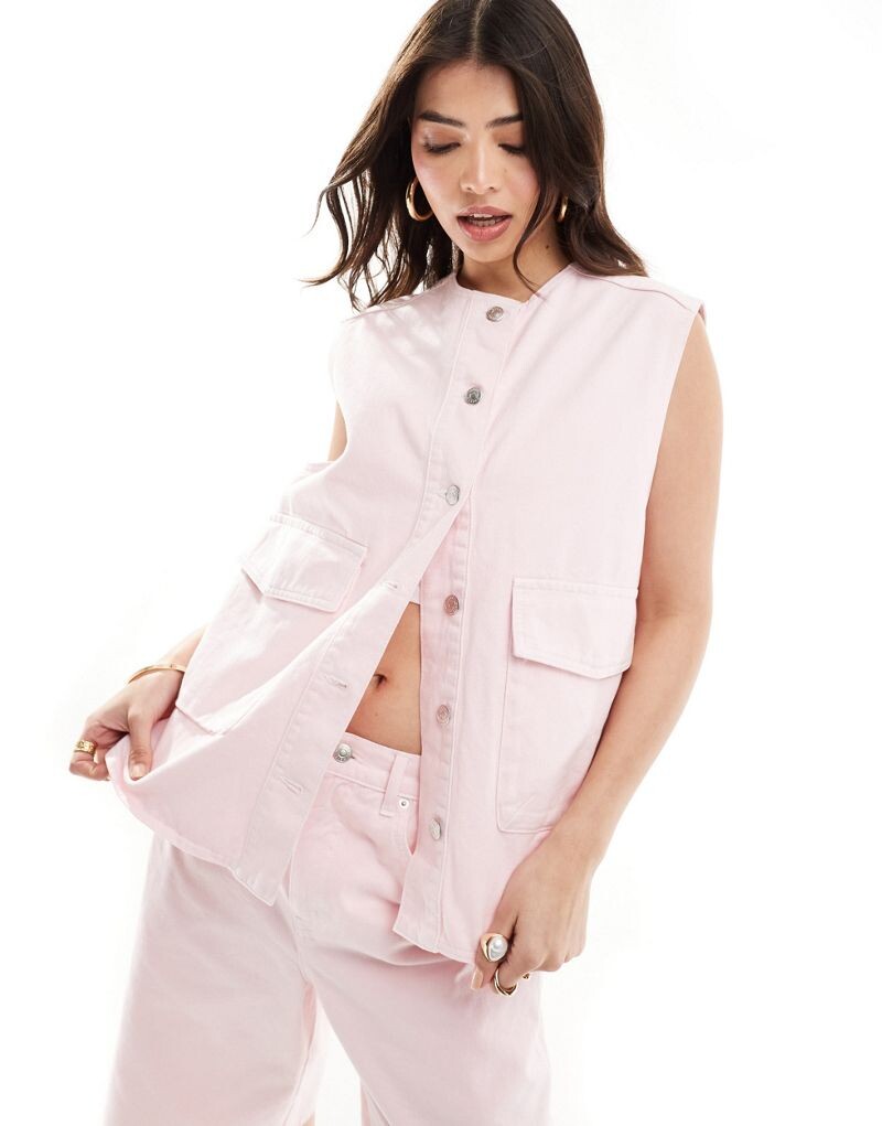 

Розовый джинсовый жилет оверсайз ASOS DESIGN