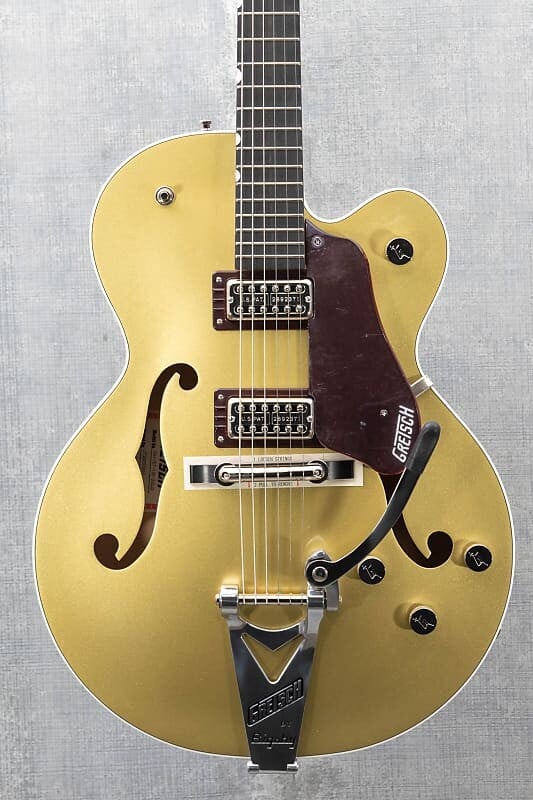 

Gretsch G6118T-135 LTD 135th Anniversary Казино двухцветный золотой/темно-вишневый металлик G6118T-135 LTD 135th Anniversary Two-Tone Casino Gold/