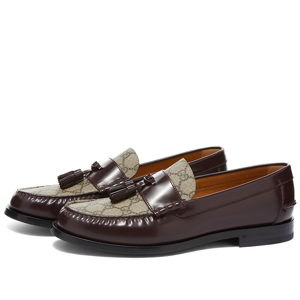 

Мокасины Gucci Kaveh GG Supreme Tassle Loafer