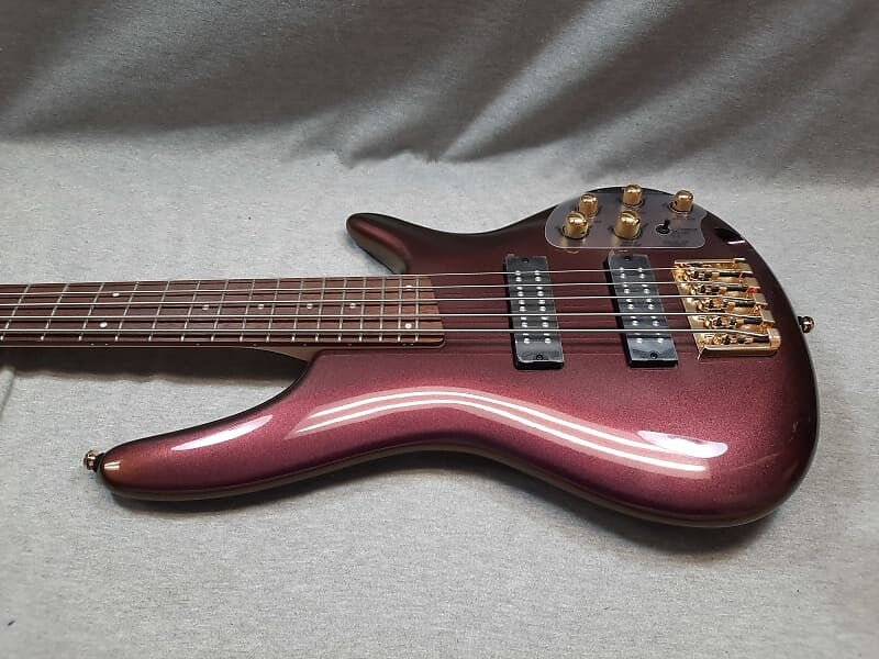 

Ibanez SR305EDX Розовое золото Хамелеон