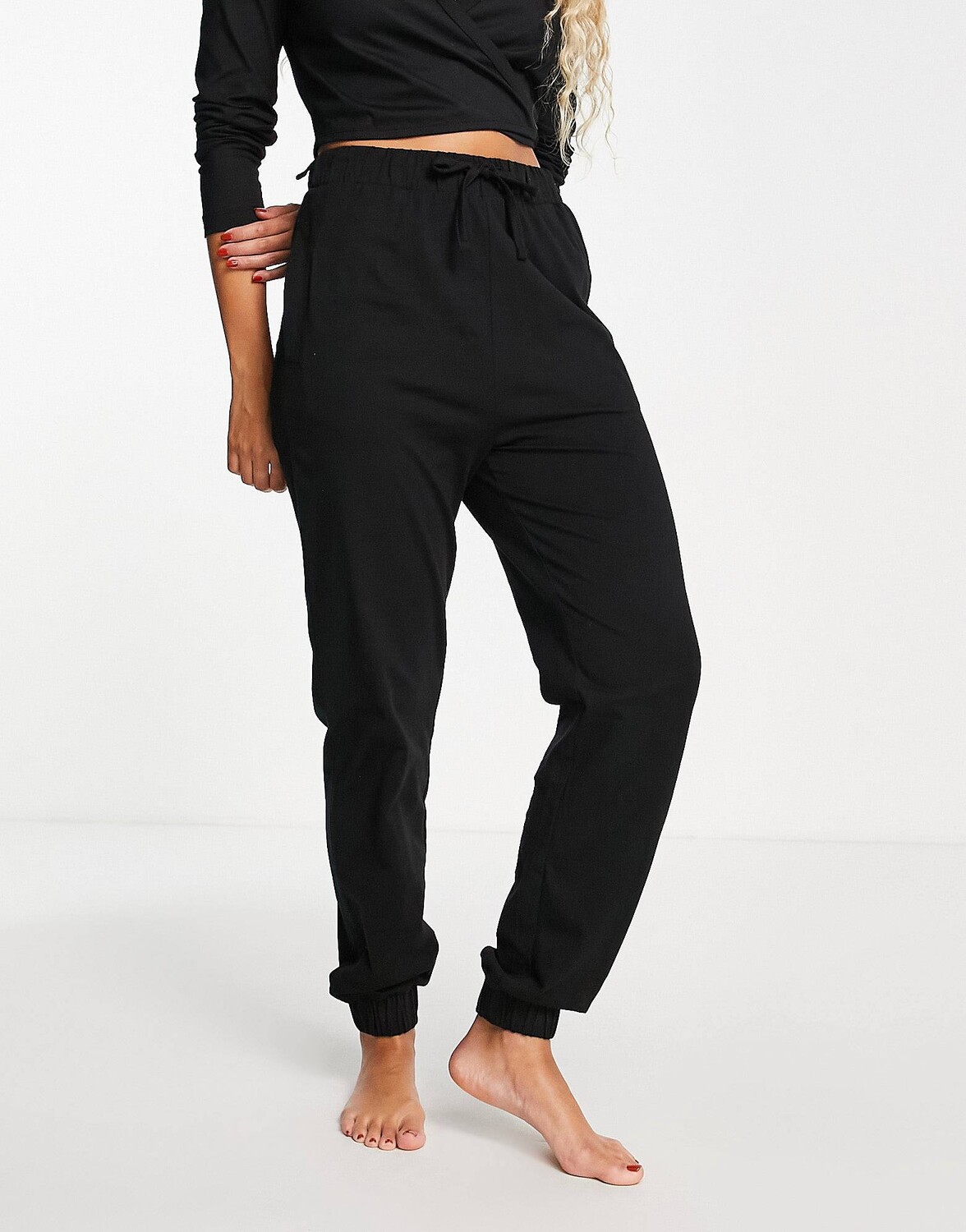 

Пижамные джоггеры из джерси черного цвета ASOS DESIGN mix & match