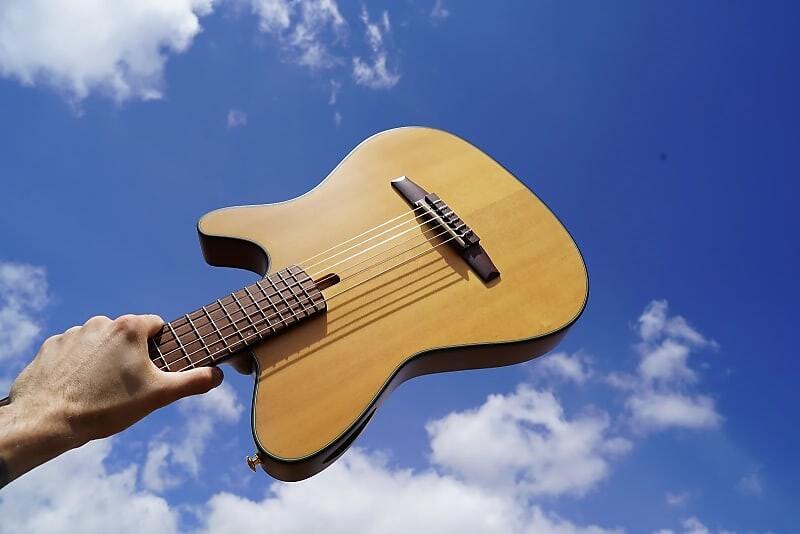

Акустическая гитара Ibanez FRH10N NTF - Natural Flat 6-String Classical Electric Guitar