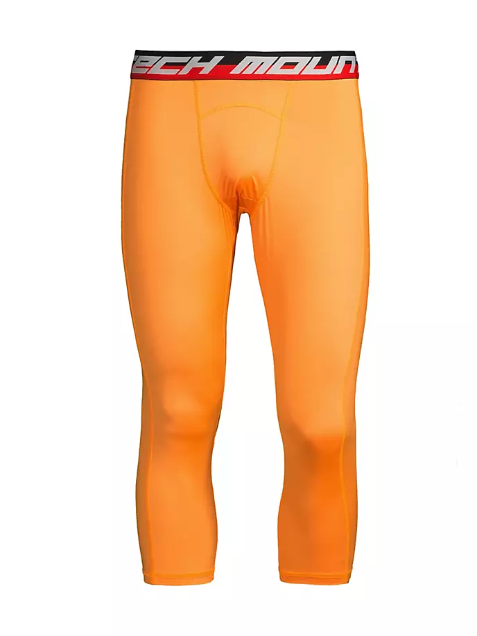Рядом с Леггинсы с логотипом Skin Aztech Mountain, цвет safety orange