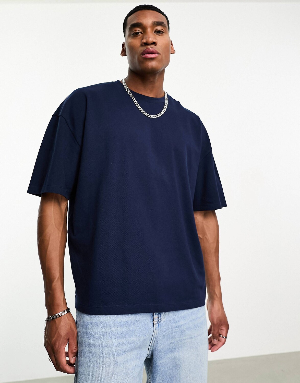 

Темно-синяя футболка оверсайз из пике ASOS DESIGN