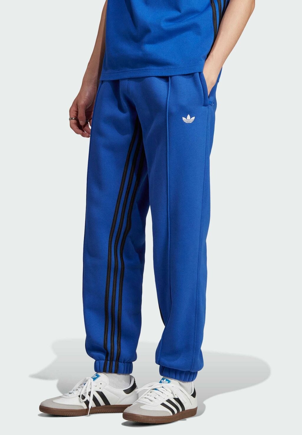 

Спортивные брюки РЕКИВЕ adidas Originals, полублестящий синий