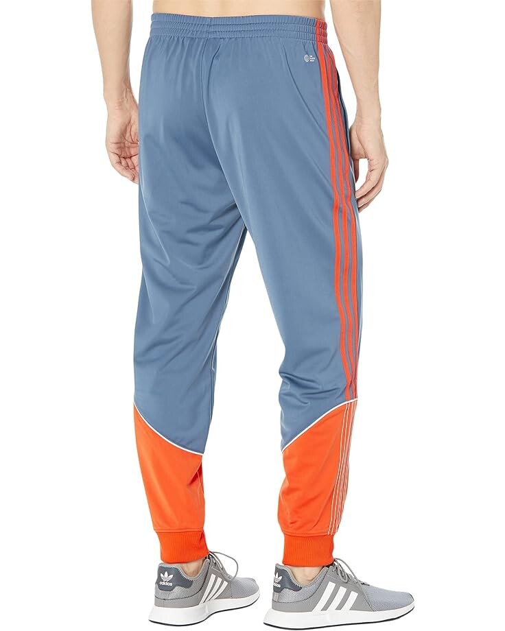 

Брюки Adidas Superstar Tricot Track Pants, цвет Wonder Steel/Semi Impact Orange/White