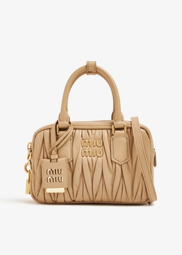 

Сумка Miu Miu Matelassé Leather Top Handle, бежевый