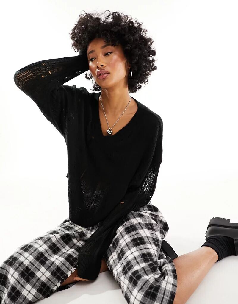 

Черный рваный свитшот adidas Originals Dark Varsity