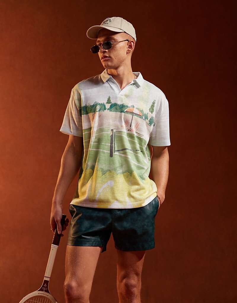 

ASOS DESIGN – Рубашка-поло свободного кроя с теннисным принтом по всей поверхности