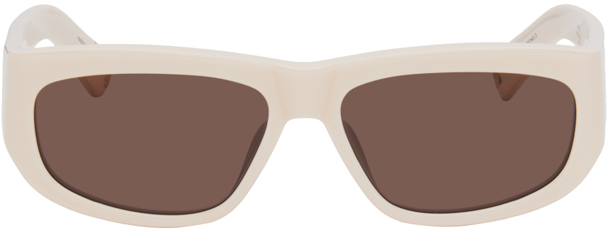 Кремового цвета солнцезащитные очки Les Lunettes Pilota Jacquemus фото
