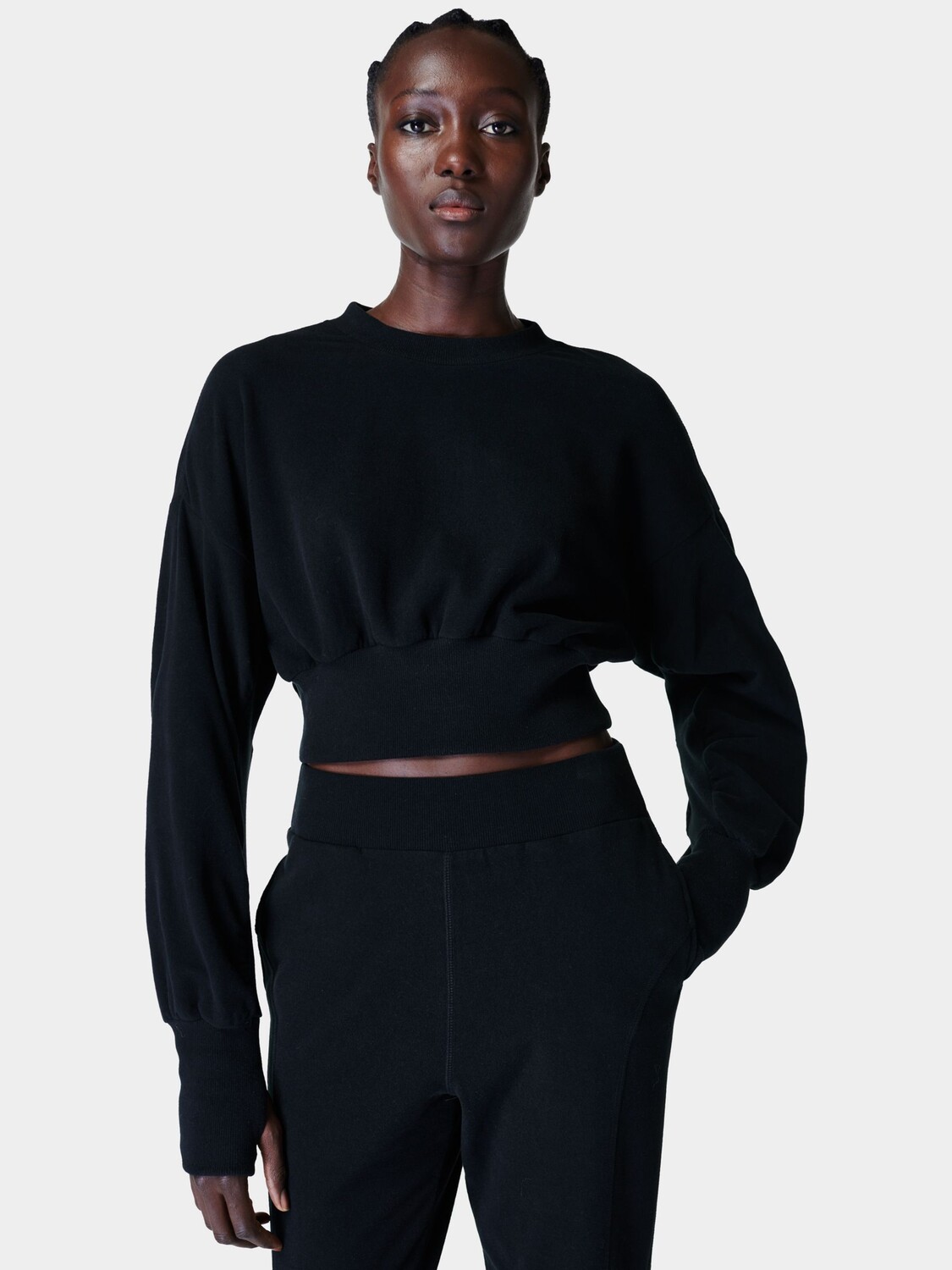 

Укороченный флисовый топ Sweaty Betty Delight Luxe, черный