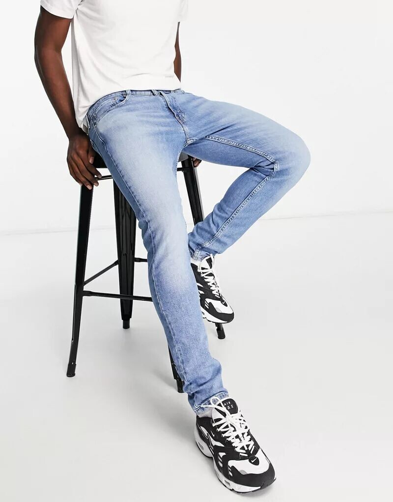 

Светло-голубые зауженные джинсы Levi's 512