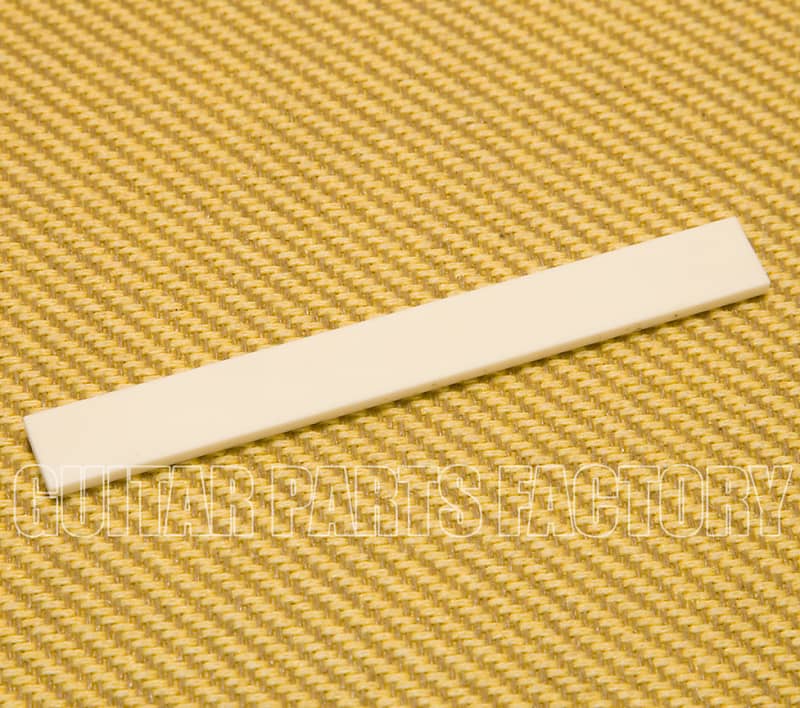 Allparts BS-0299-000 Седло для акустической гитары Extra Long Bone, 4 x 3/32 x 15/32 BS-0299-000 Extra Long Bone Guitar Acoustic Saddle, 4 x 3/32 x 15/32 1 guitar bridge pins for acoustic guitar peg replacement musical instrument abalone shell dots fixed string nail saddle nut bone